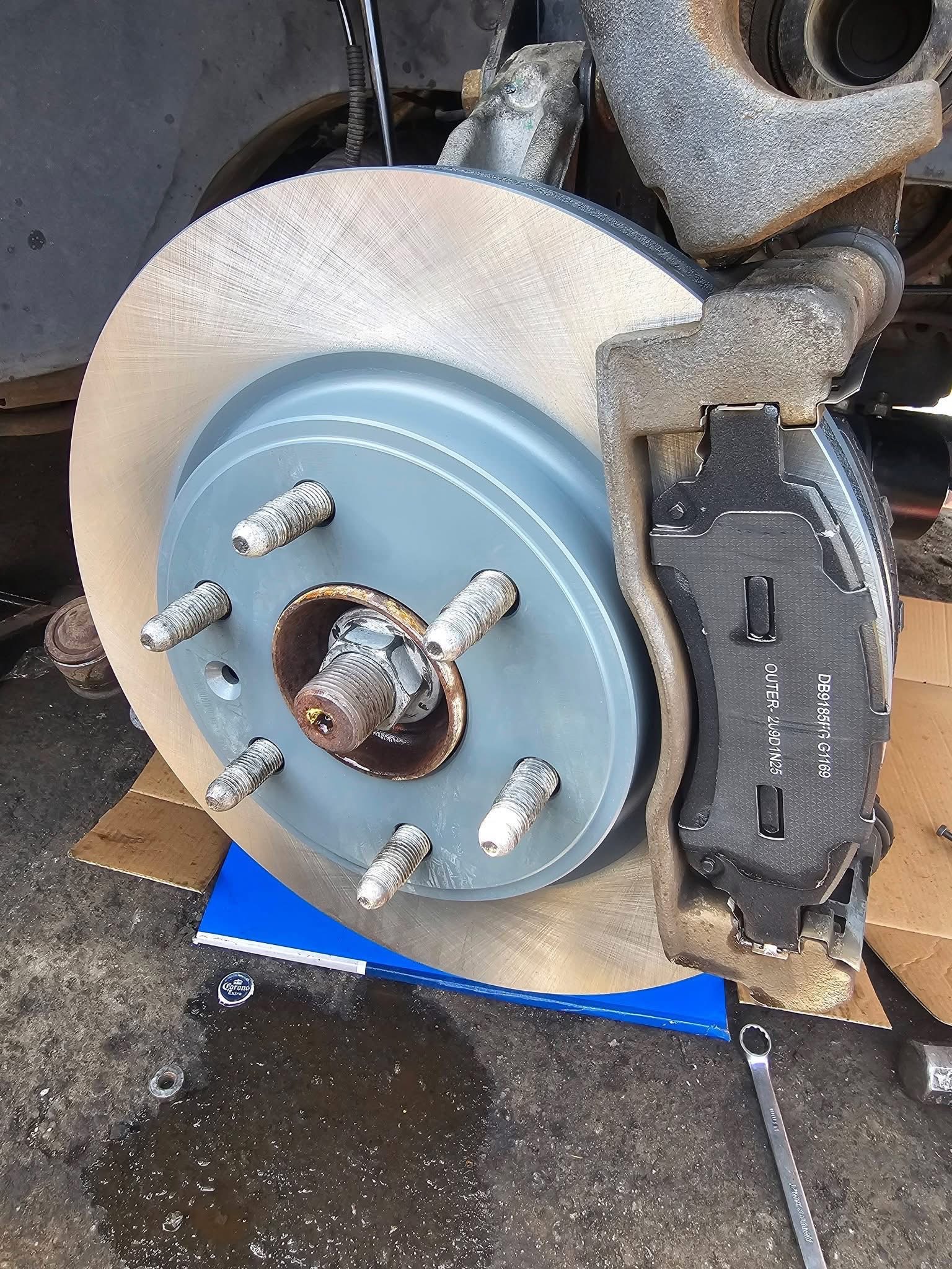 New brake rotor and caliper work