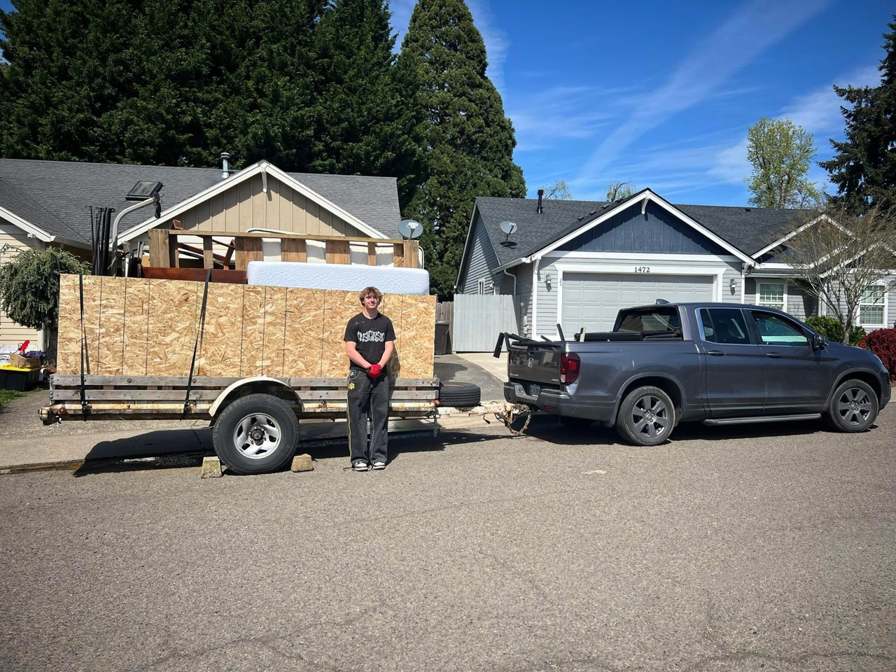 Truck and trailer loaded for a West Linn junk removal pickup